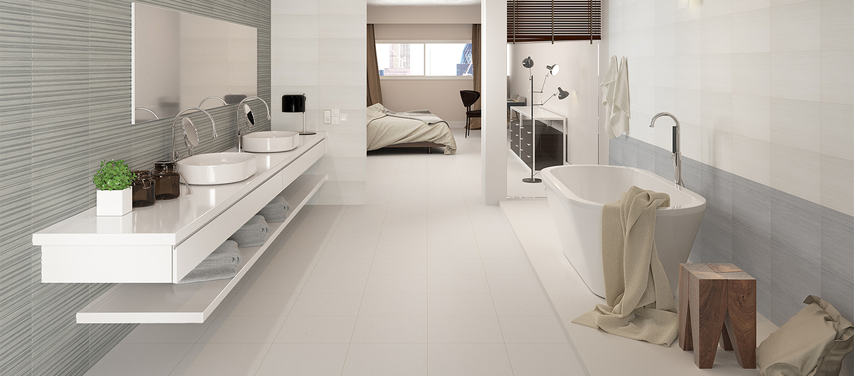 Baño con pavimento de gran formato